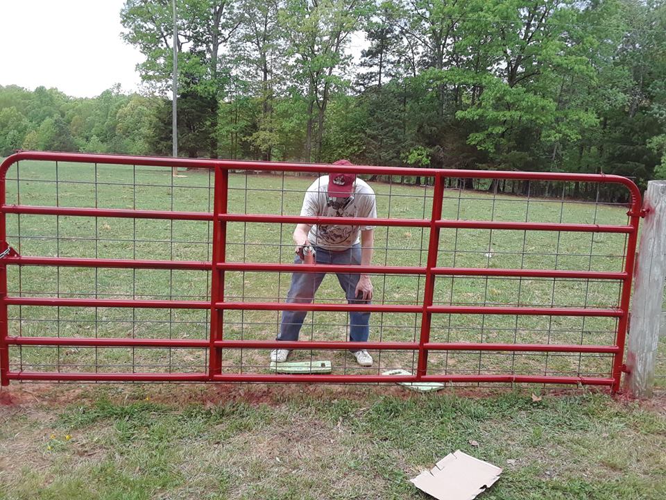Volunteer Ron painting the gates too!! 